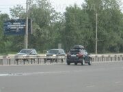 Октябрьский мост, движение на левый берег, разделительный островок (Б)